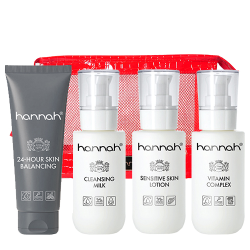 hannah Huidverzorgingsset Medium bestaande uit vier producten: 24-Hour Skin Balancing, Cleansing Milk, Sensitive Skin Lotion en Vitamin Complex, inclusief rode toilettas.